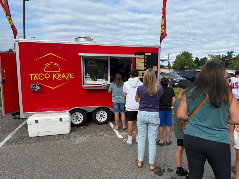 Supporters line up at the Taco Kraze truck.