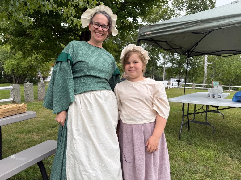Recreation Committee member Gretchen Whitcomb of Temple and Clara Whitcomb dressed up in colonial-era garb during the festivities.
