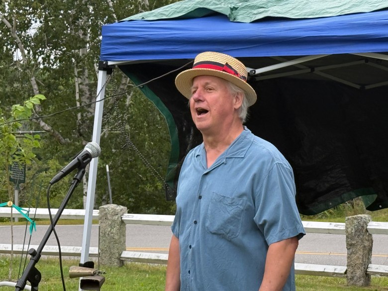 Phil Lauriat of Temple opens the festivities with the National Anthem and God Bless America.