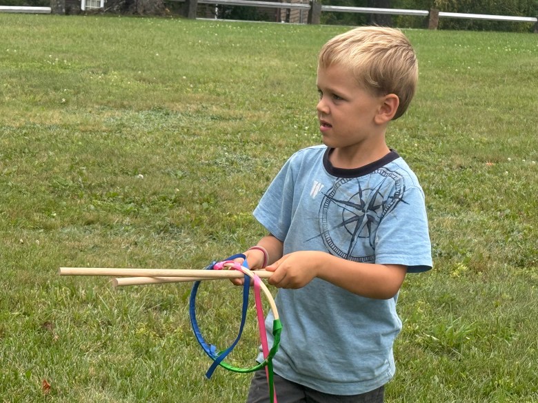Marcus Petersons plays an old-fashioned lawn game.