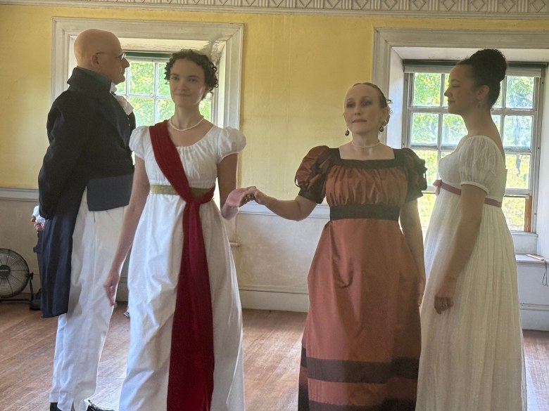 The Footwork and Frolic Society, including Catherine Backer and Lauren Garrison, front, and James Sadino and Quinn Burgess, back, show examples of 1800s dances. 