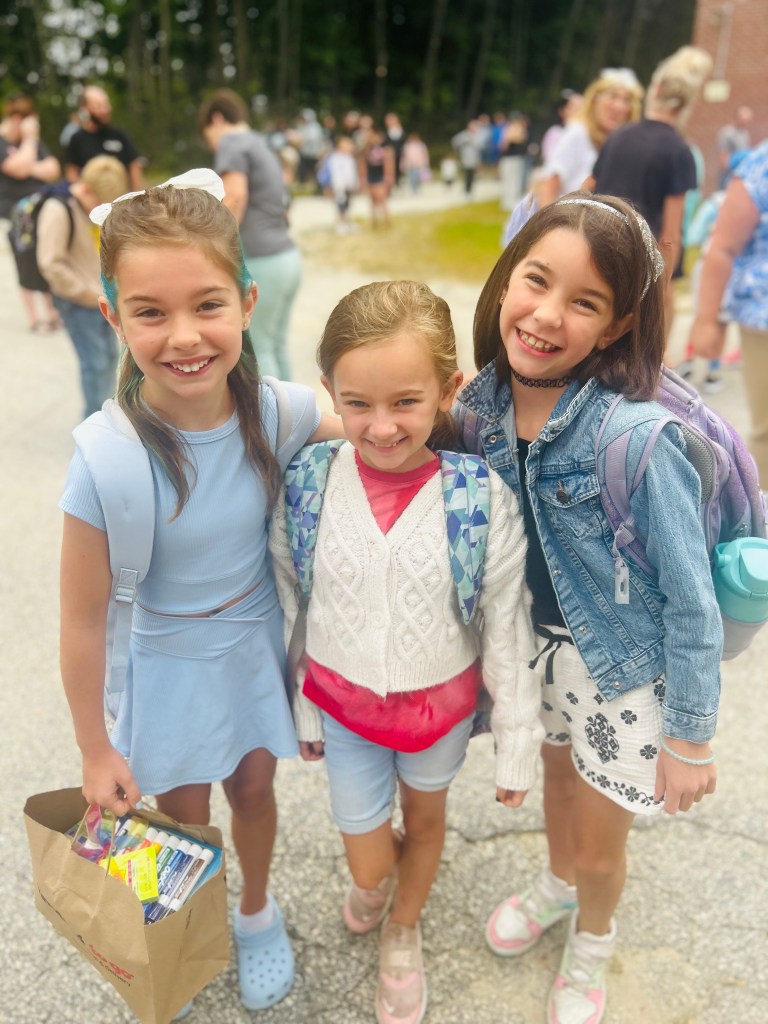 Emmelynn Ringer (4th grade), Claire McCarthy (2nd grade) and Adalynn Norby (4th grade) are ready for their first day at Jaffrey Grade School.  