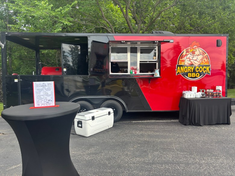 The Angry Cock BBQ truck set up at the Hancock Farmers' Market.