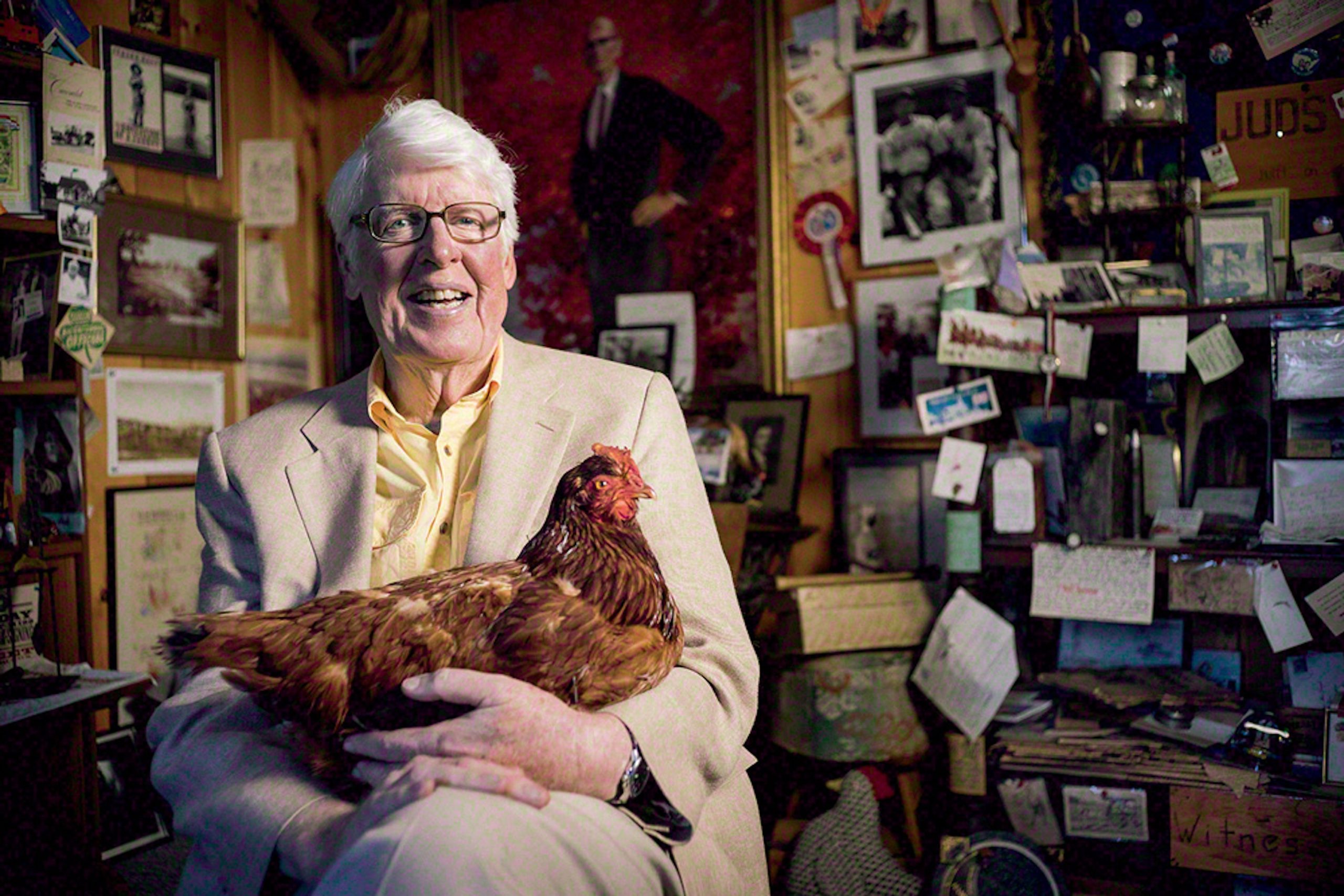 Jud Hale, pictured in his office "museum." He often traveled with his chicken on his national publicity tour for The Old Farmer’s Almanac.