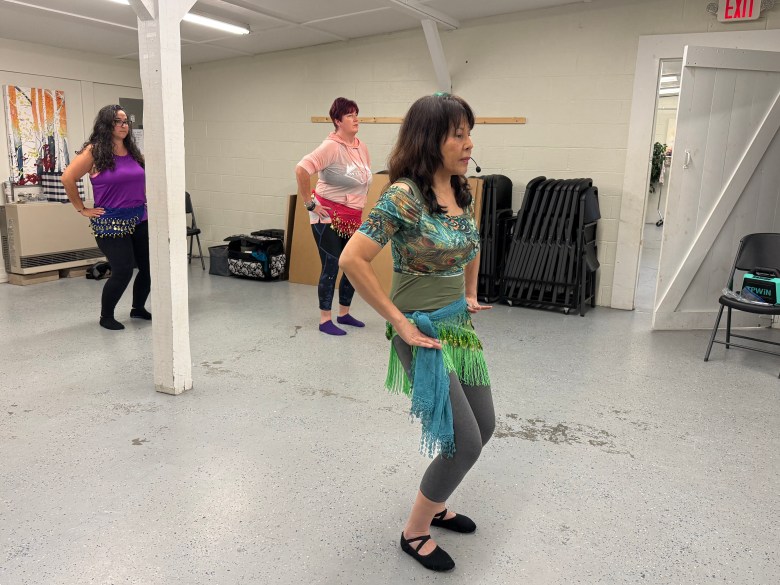 Instructor Elisa Fitzgerald leads a belly dancing fitness class at the Jaffrey Recreation Department.