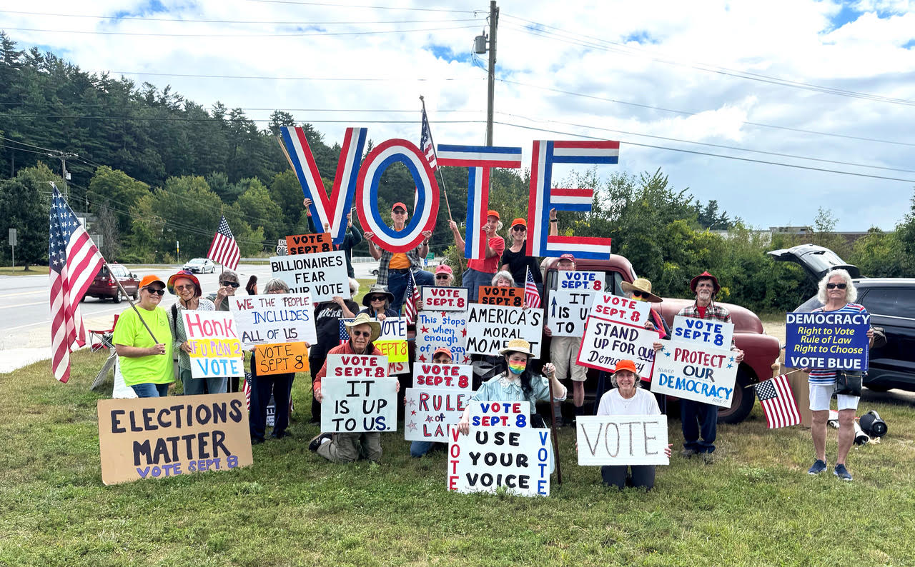 Demonstrators gathered in Peterborough ahead of the primary election with two recurring pro-democracy vigils focused on encouraging voter participation.