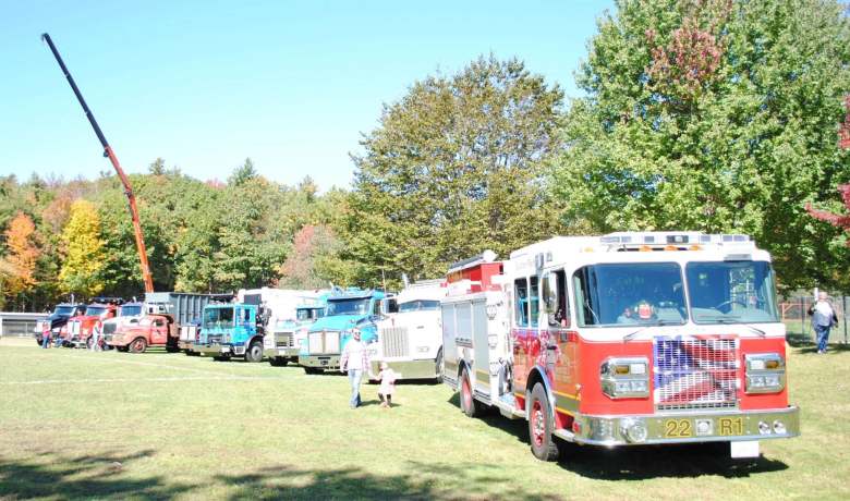 Various town vehicles and vehicles from local businesses make up a Touch-a-Truck area.