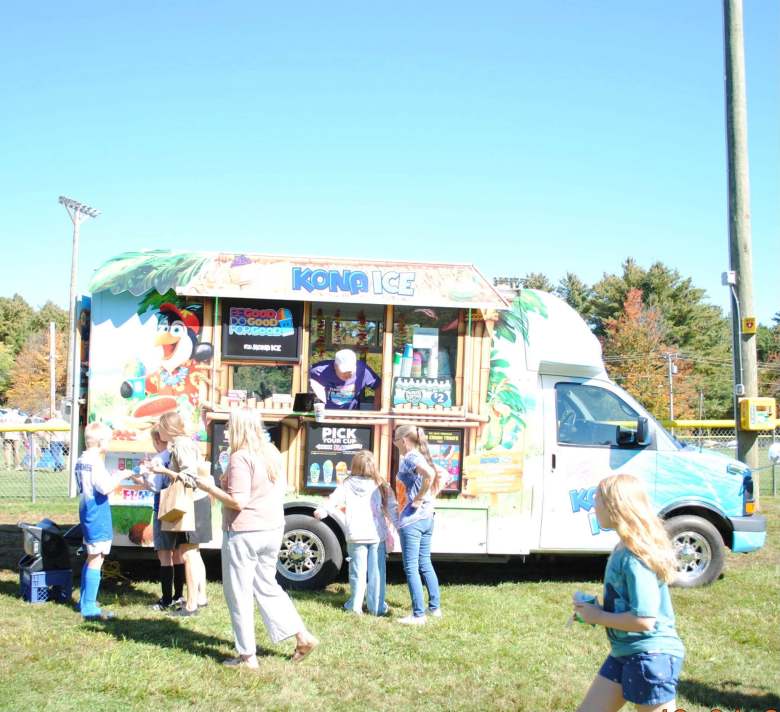 Residents get a sweet treat from the Kona Ice truck.