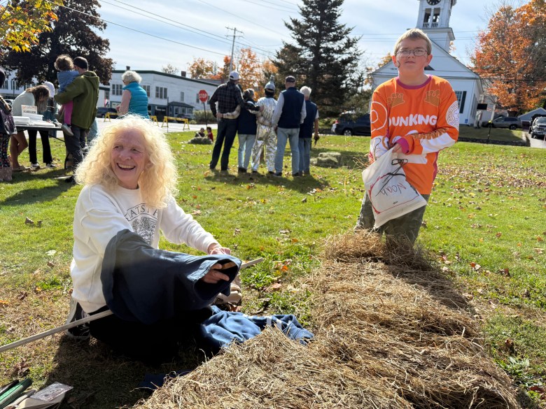 Becky and Noah Myott of Jaffrey build a scarecrow, named after Noah, together. 