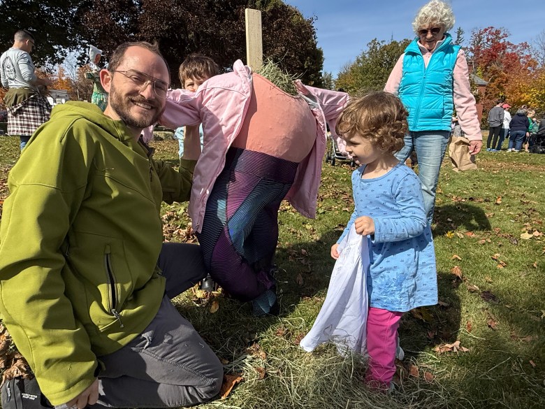 Pascal Le Boeuf and Io Le Boeuf make a scarecrow, dressed in Io's favorite color pink. 