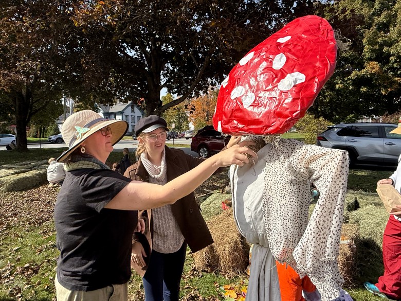 Summer and Eloise Langille of Jaffrey create their scarecrow, "The Mushroom Lady."