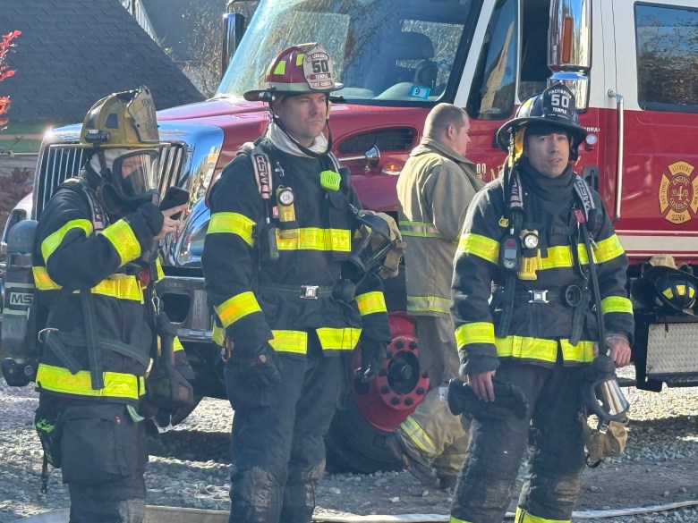 Temple firefighters Captain Tim Pervere, Lt. ameson Hannon and Steve Concordia observe.