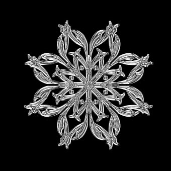 Snowflake/ice crystal in closeup.