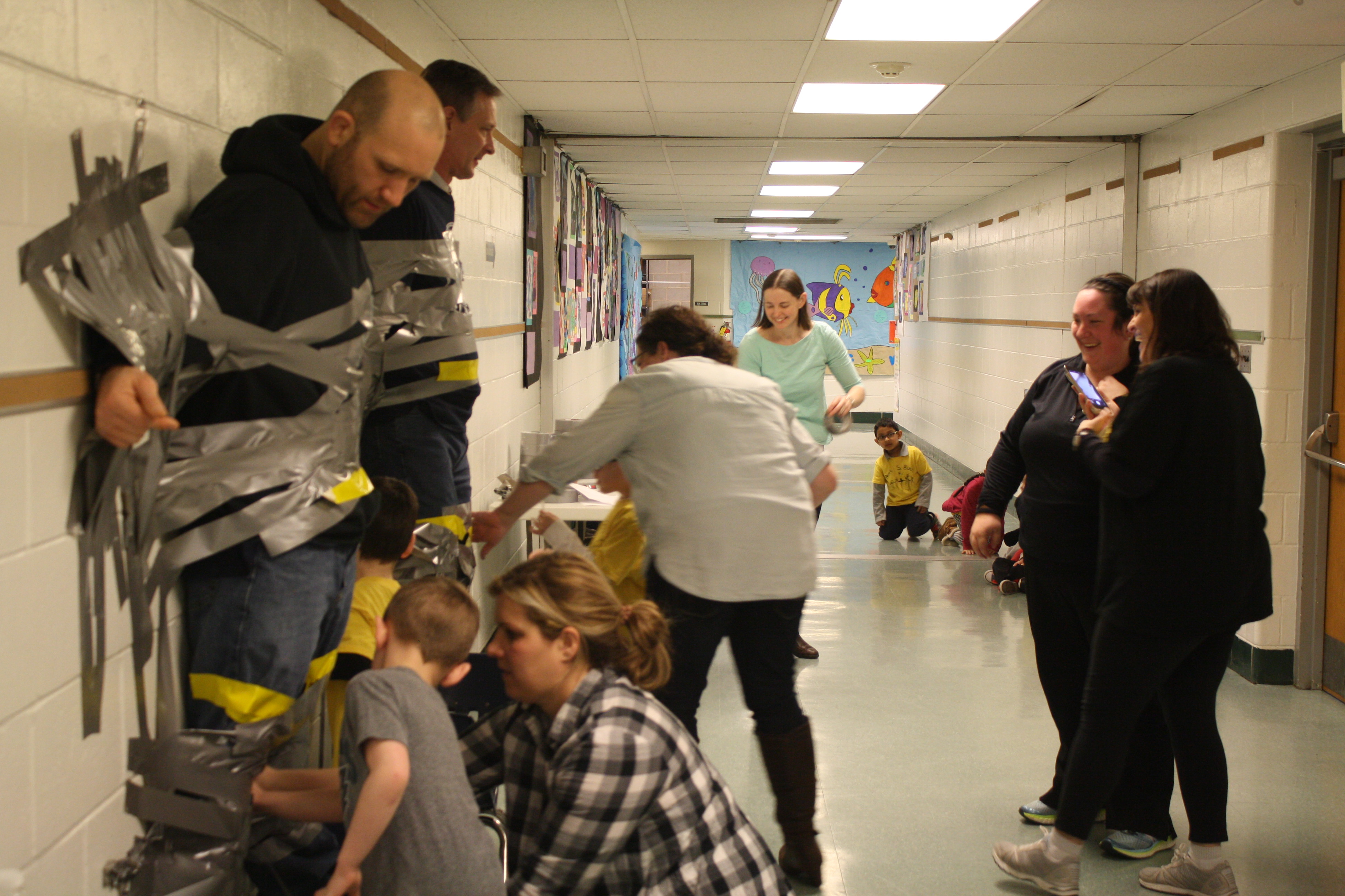 Elementary School Students Duct Tape Educators To Wall