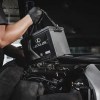 Lexus-certified technician installing a battery in a Lexus vehicle