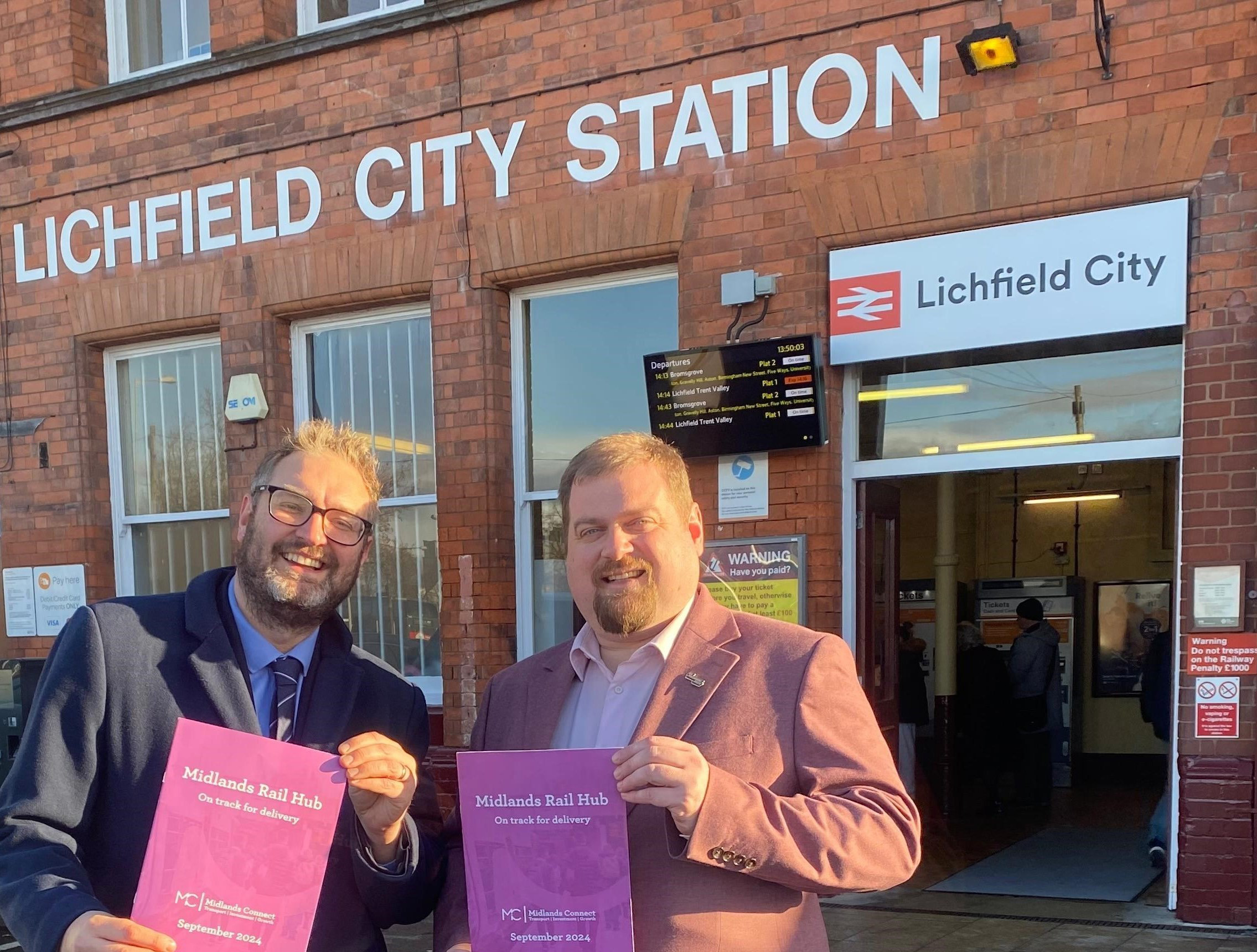 Paul Butters from Midlands Connect with Dave Robertson MP outside Lichfield City Station
