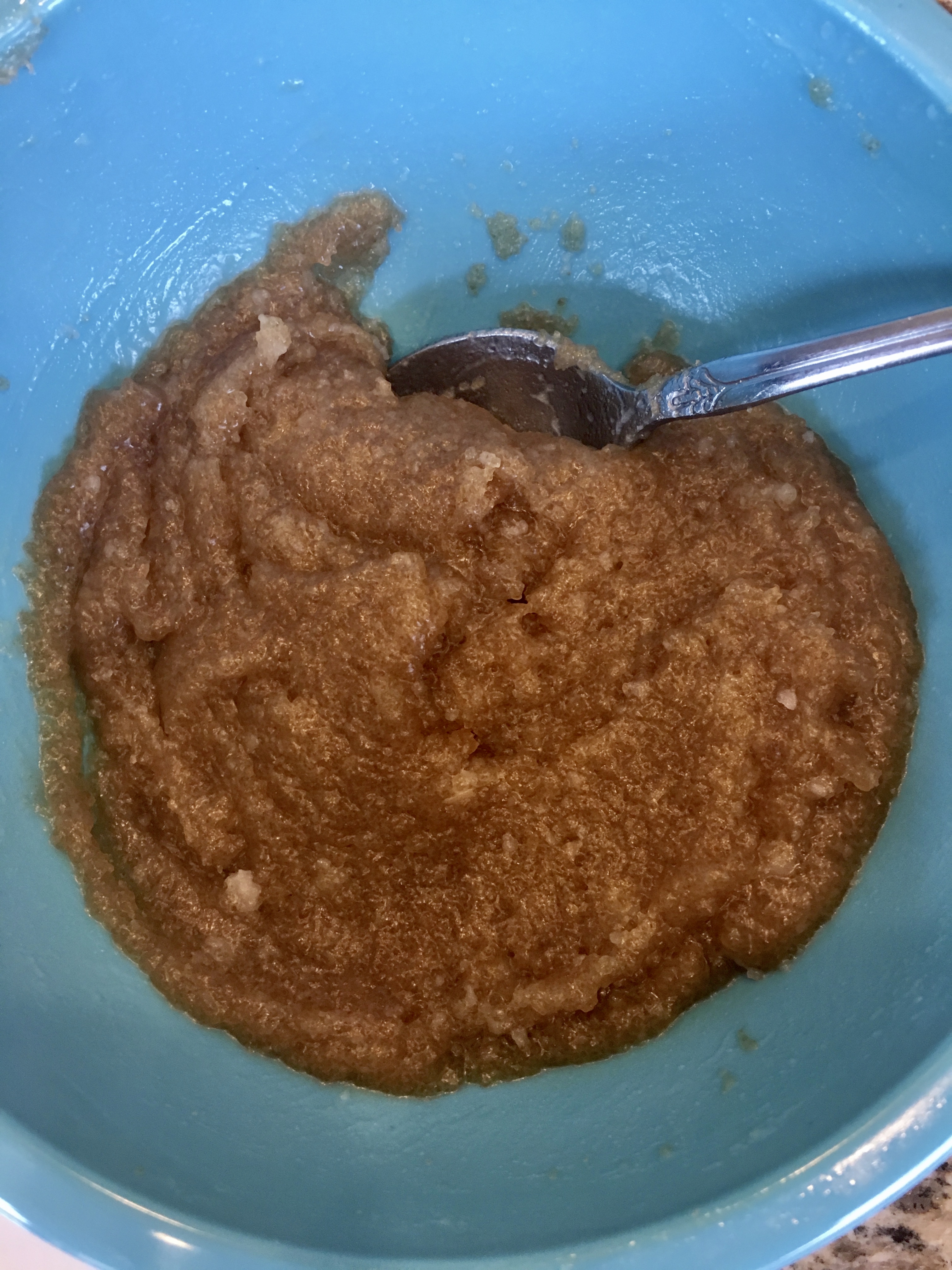 close up. working out the coconut oil clumps