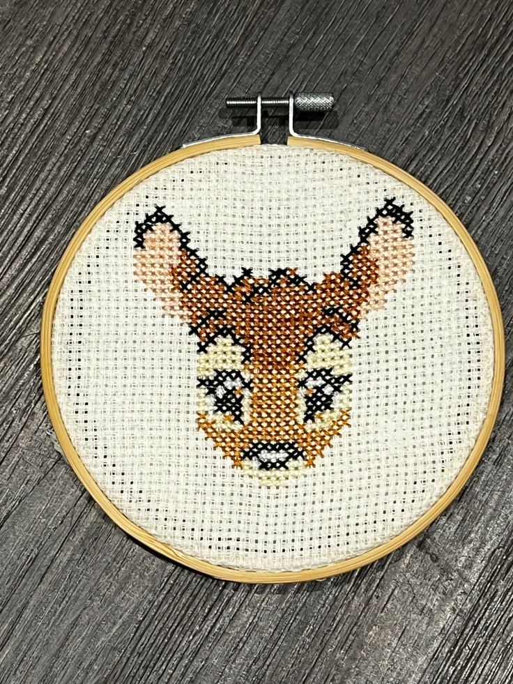 Completed cross-stitch of a Disney's Bambi