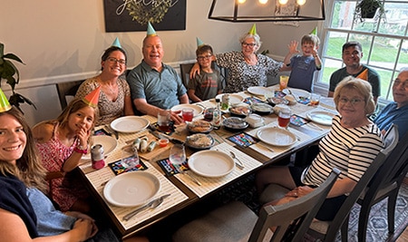 Evan and Rachel's family gathered around the dinner table