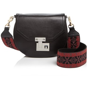 Rebecca Minkoff Embroidered Guitar strap handbag.