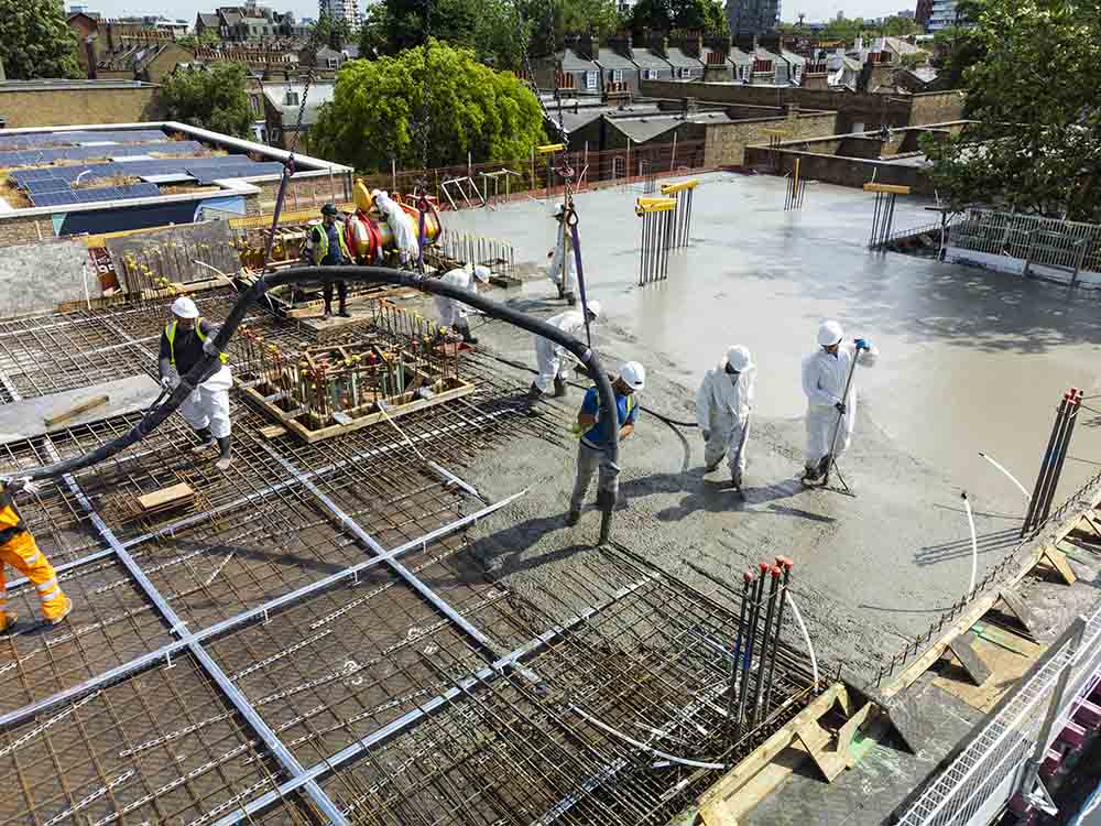 Building Site view pouring concrete on roof