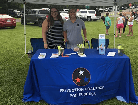 PC4S staff and volunteers at a community prevention booth
