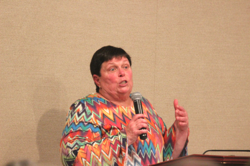 Cathi Cox-Boniol credits parents while accepting Robert E. Russ Award
