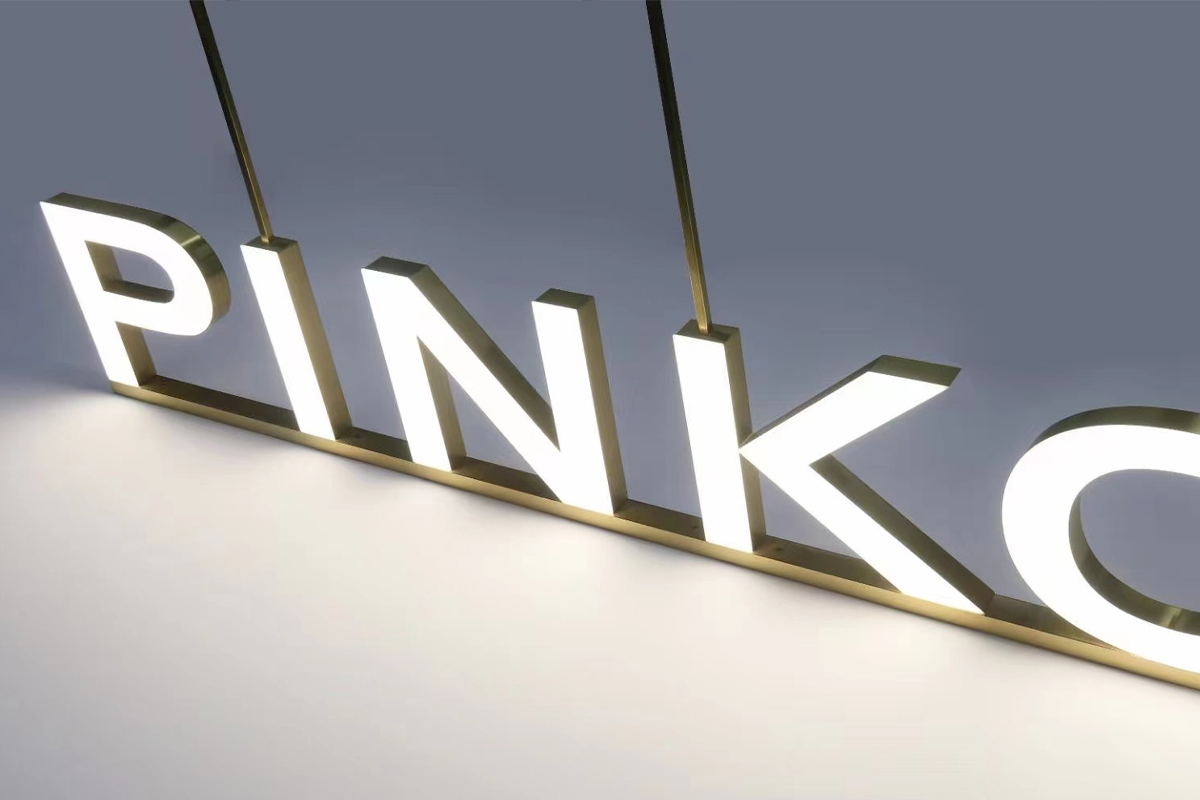 Elevated Lettering Signage on Ceiling Raceway raised lettering signage