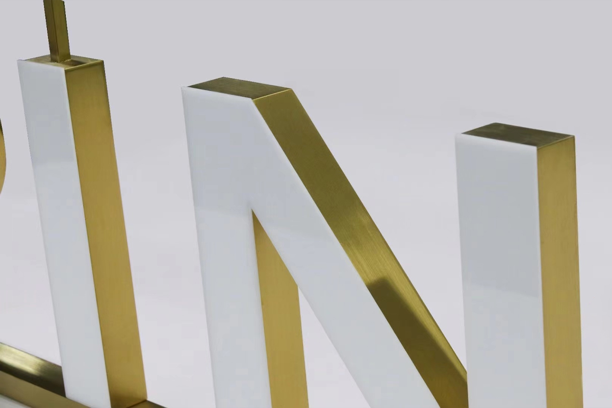 Relief Lettering Sign on Ceiling Mount Raceway