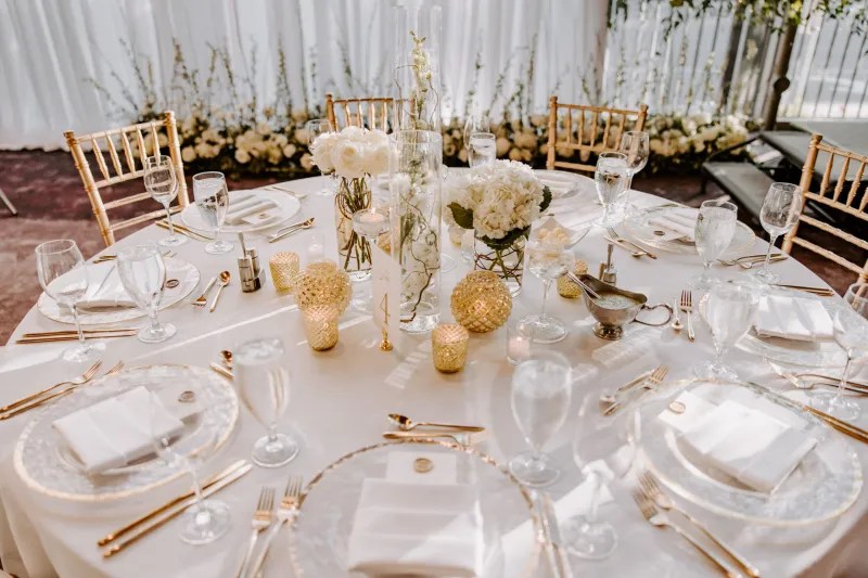 Elegant event with gold chiavari chais.