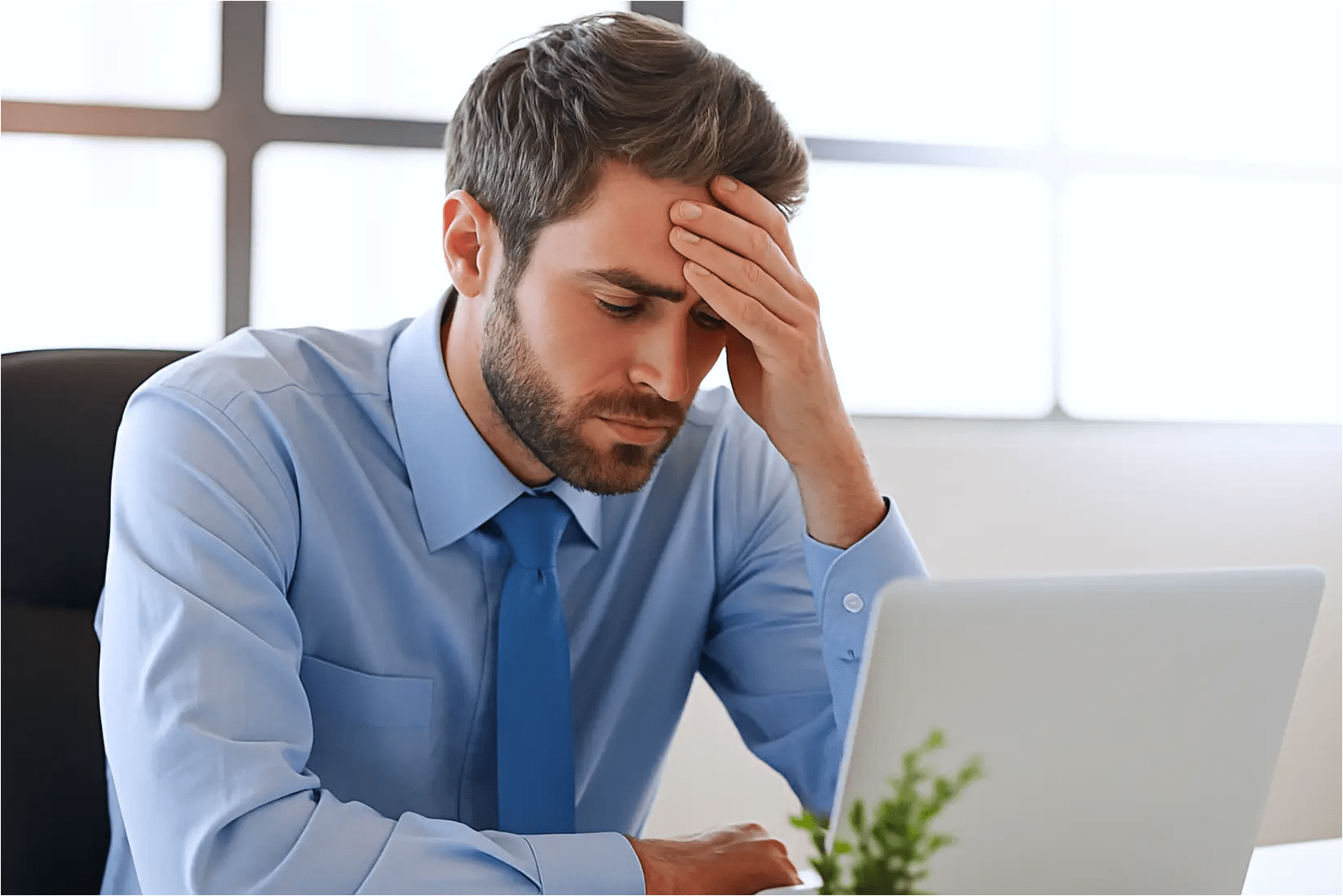 Frustrated analyst overwhelmed by digital clutter and disorganized data