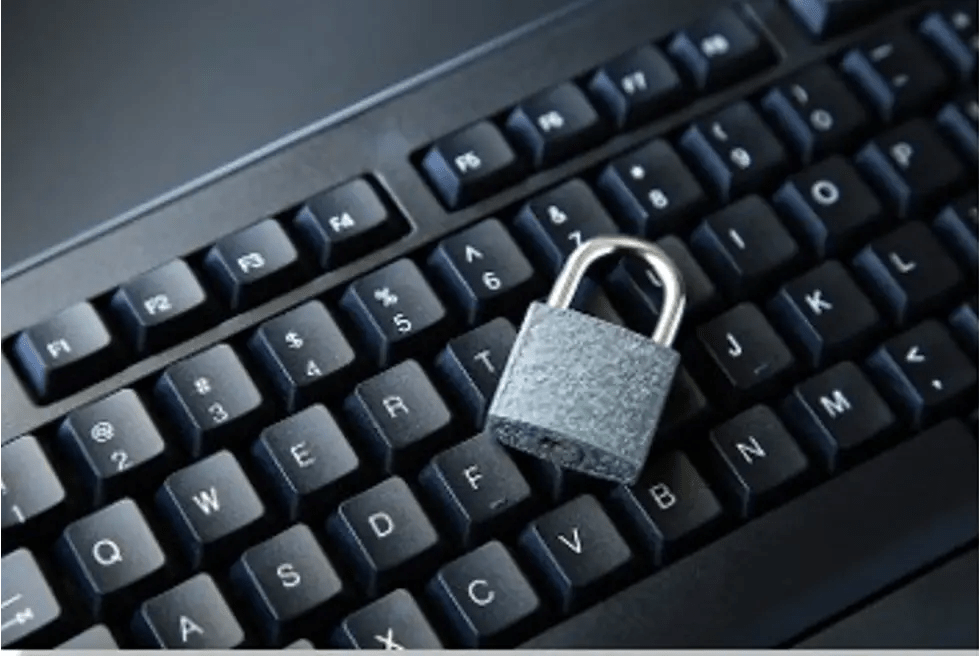 Padlock placed on computer keyboard symbolizing cybersecurity and protection against ransomware