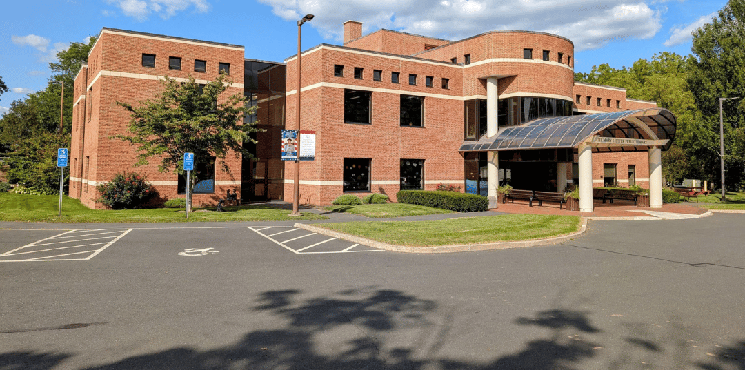 events location south windsor library with brick facade and curved entryway