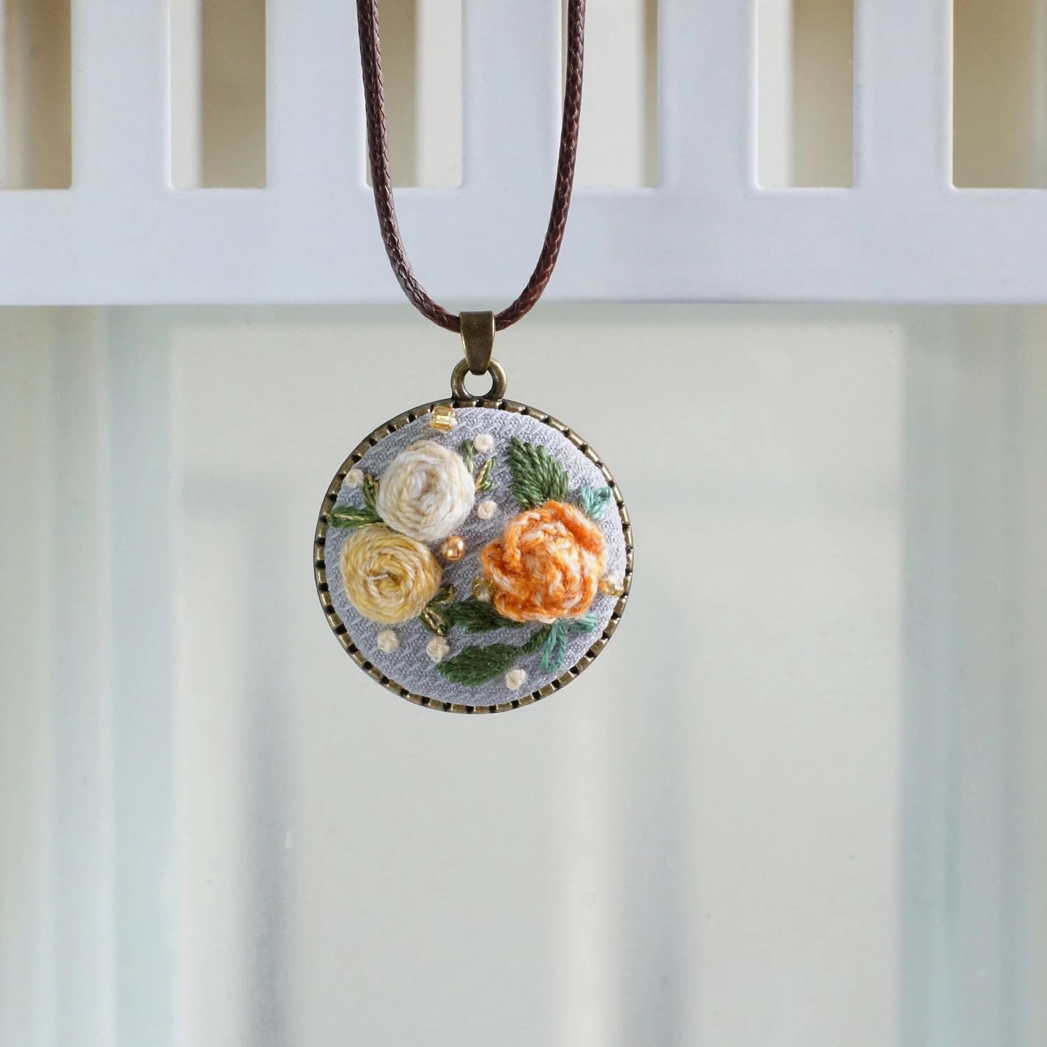 orange roses floral pendant