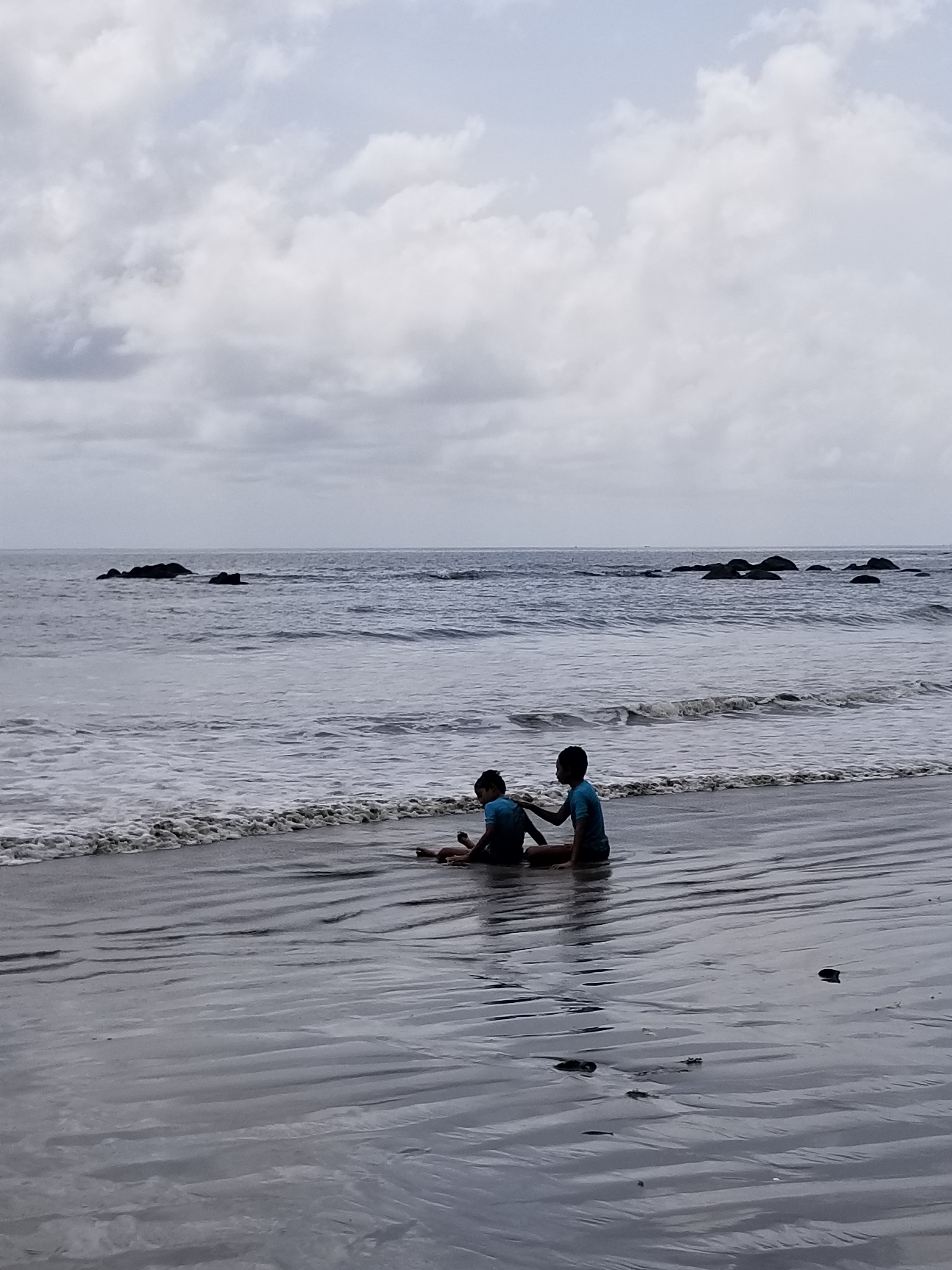 Friends playing at the beach. Sierra Leone, 2017.