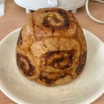 Roly-poly Steamed mincemeat pudding on a plate