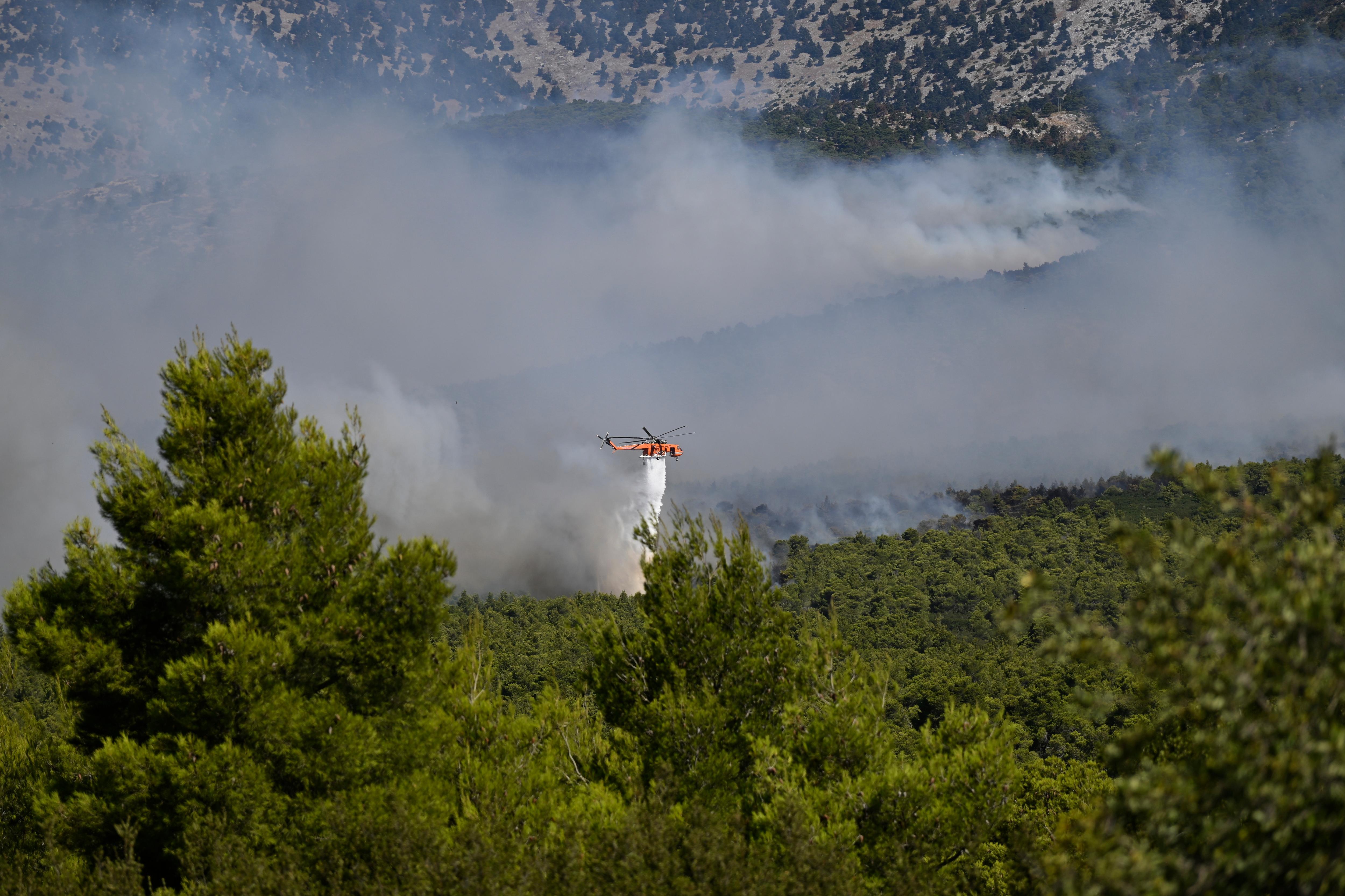 Greek Firefighting Helicopters Collide: Deadly Midair Crash in Athens Wildfire (2026)