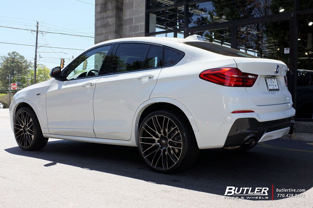Call or visit us today! BMW X4 with 22in Savini BM13 Wheels and Michelin PS2 Tires