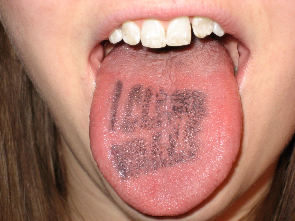Tongue Tattoo | From A Fruit Rollup Spiderman Promo. It Says… | Flickr 768_x_1024_jpg