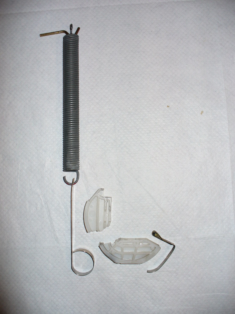 Broken dishwasher spring component