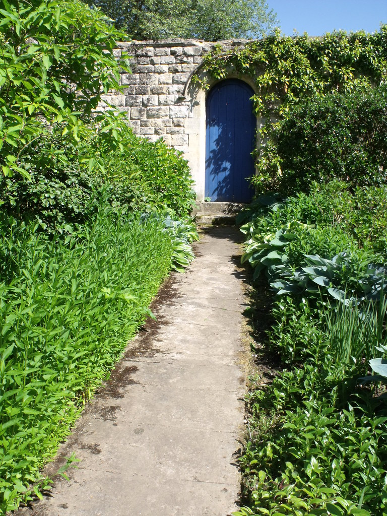 Kiftsgate Court, Chipping Campden, Gloucestershire - door on the wall