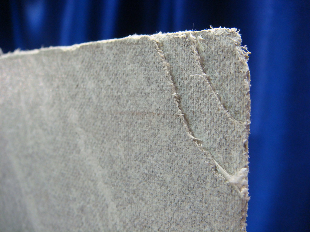Our testing kits contain everything you need to take and send your sample off, including: Asbestos Cement Panel Close-up | Corner of a cementitious