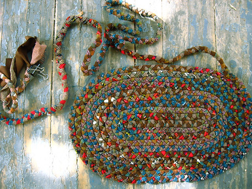 Crafting a braided rug from colorful fabric.