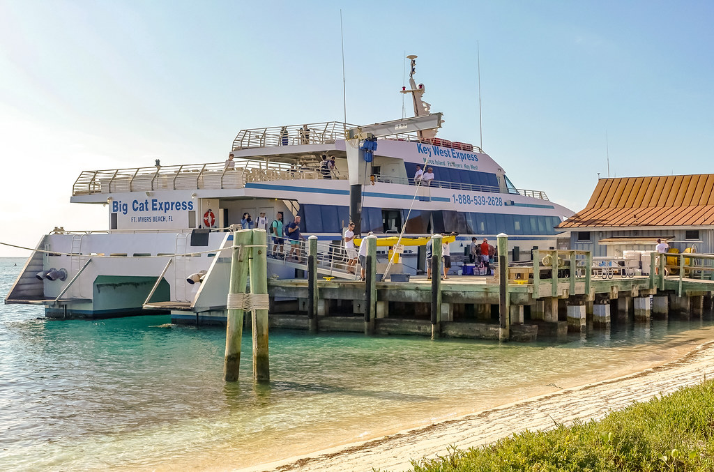 No key west beach trip is complete without visiting the best beach in the florida keys: Visitors Arrive By Catamaran At Dry Tortugas National Park Flickr
