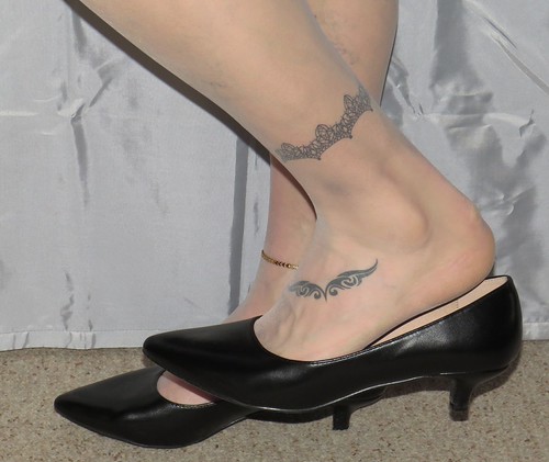 Leather kitten heels, nylons, tattos and anklet