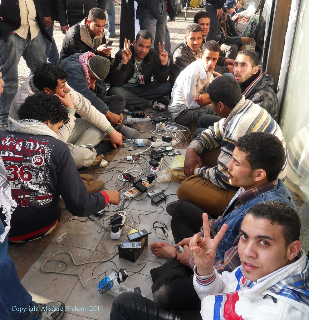 Tahrir Square - Protesters Charging Mobile Phones