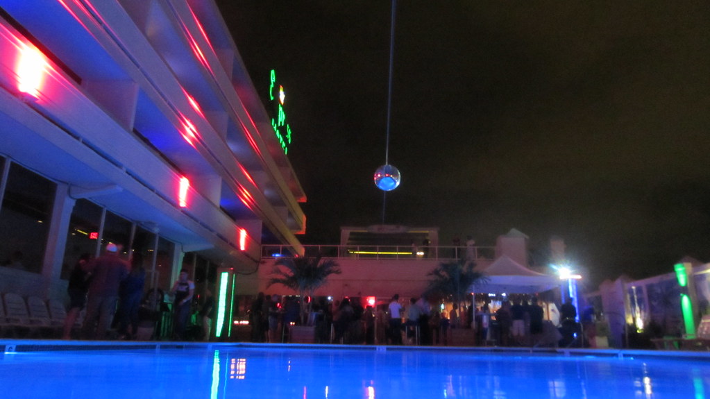Disco Mirror Ball Above Outdoor Swimming Pool At Paradise