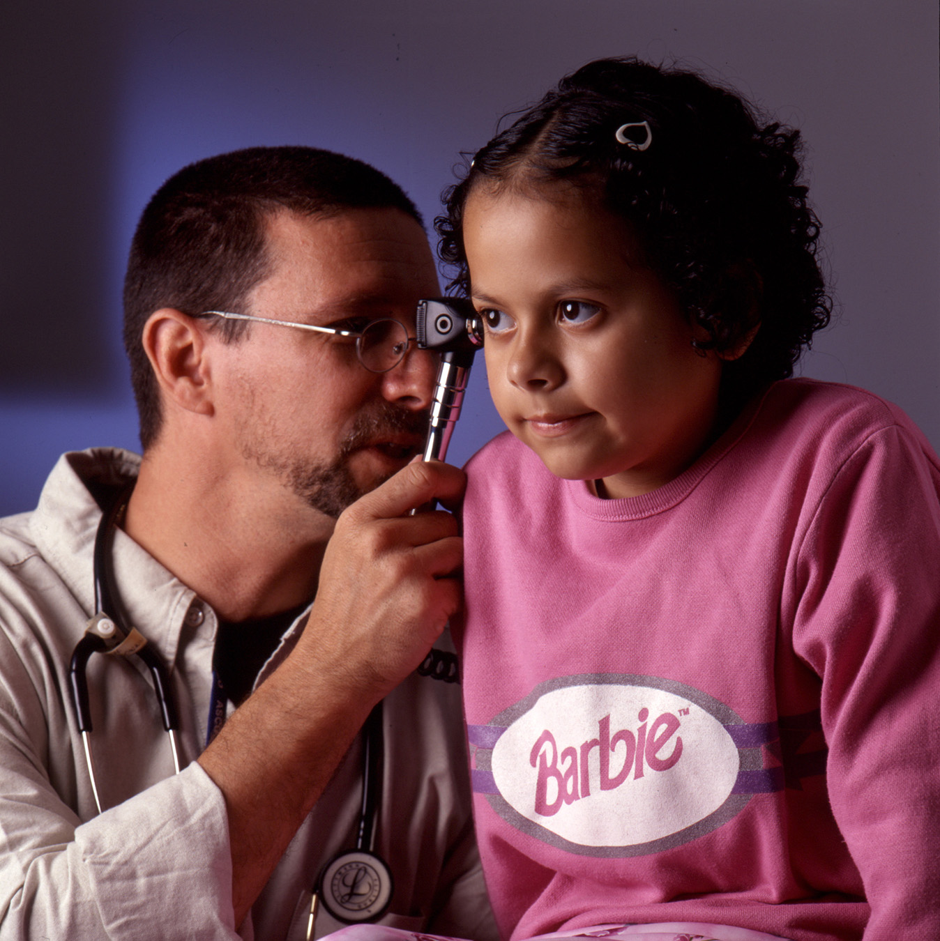 A doctor at Children's Hospital with his young patient.