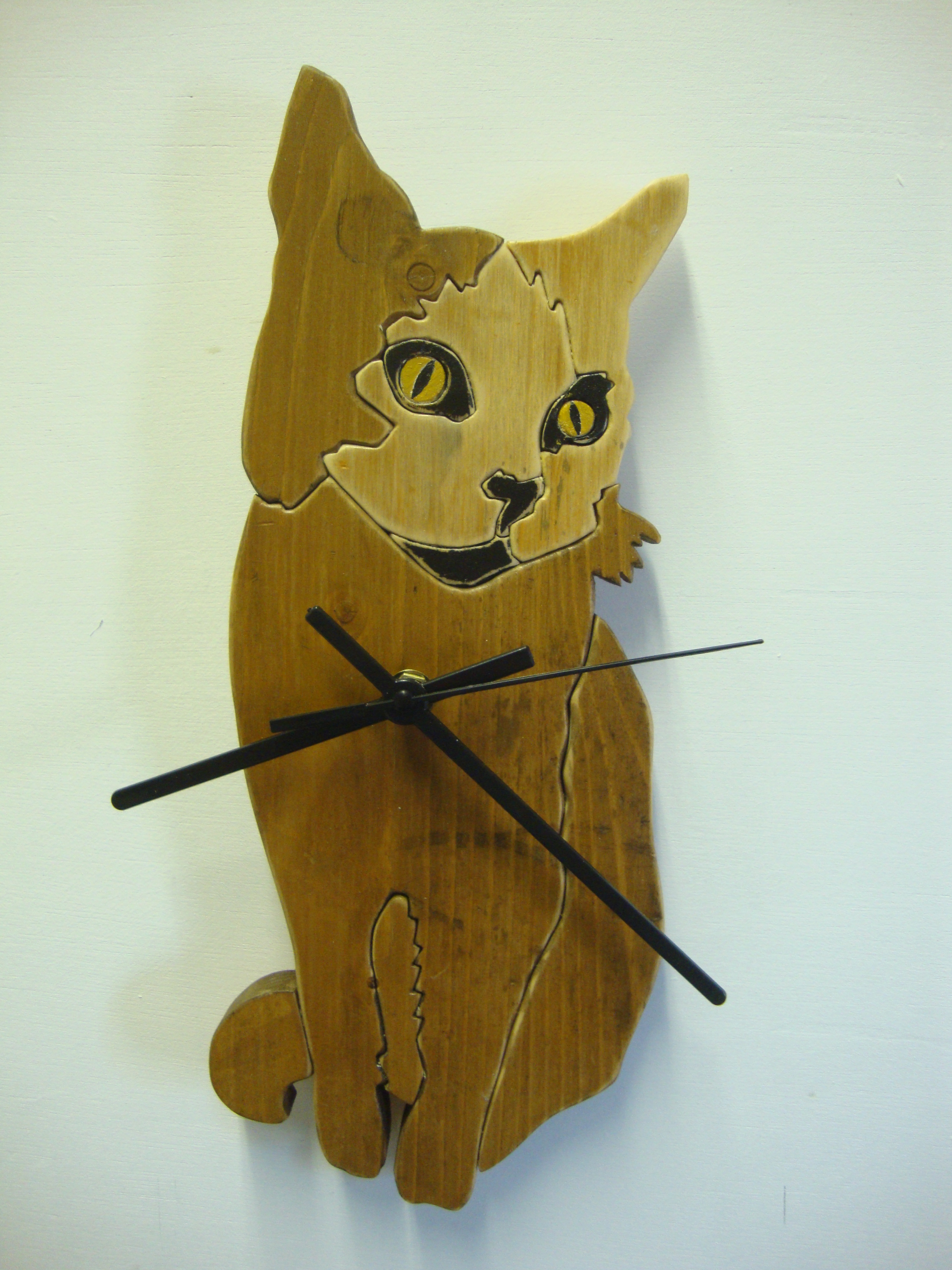 Cat clock made from up-cycled material