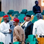 Nigerian politicians at a political gathering illustrating the growing trend of party defections ahead of elections.